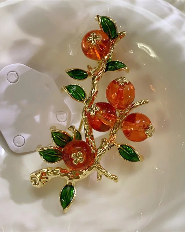 Exquisite Ruyi style Chinese brooch in gold tone, traditional auspicious symbol pin with intricate metalwork and vintage charm, perfect for cultural elegance.