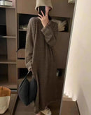 Women's pure cashmere striped knit dress, featuring a relaxed ankle-length silhouette and tonal stripes for cloud-soft warmth and timeless elegance this winter.