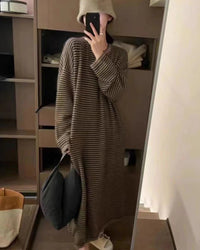 Women's pure cashmere striped knit dress, featuring a relaxed ankle-length silhouette and tonal stripes for cloud-soft warmth and timeless elegance this winter.