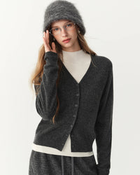 A rib-trim wool v-neck cardigan with v-neck, button front, ribbed trims, regular fit, long sleeves and stretch, designed for a cozy winter layering look that pairs from sneakers to boots.