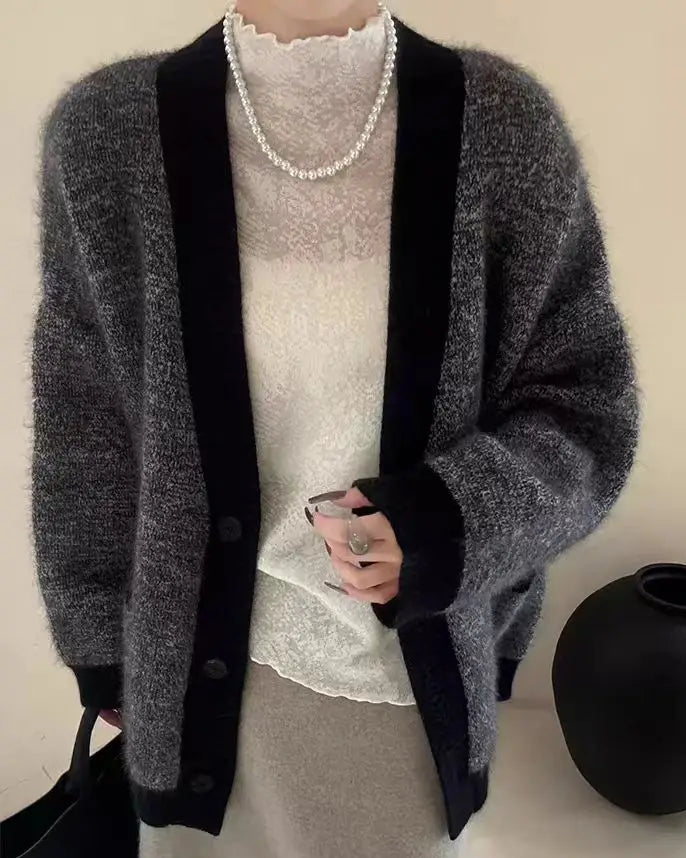 Defined by a V neckline and an easy, loose fit, this knitted cardigan offers a considered approach to everyday layering.
