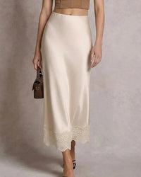 Women's satin A-line maxi skirt featuring breathable polyester-elastane fabric, a delicate lace trim hem, and a natural waist for poised elegance in summer office wear.