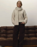 A Loose Soft V-Neck Sweater With A Scarf