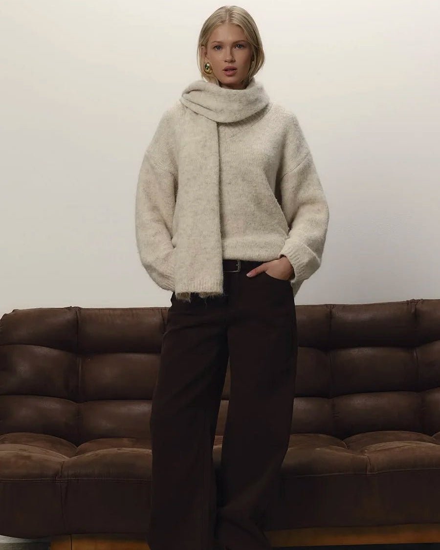 A Loose Soft V-Neck Sweater With A Scarf