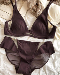 Stylish French deep V push-up bra and underwear set for women, crafted with ultra-thin seamless material and hollow cutouts, comfortable intimate lingerie ideal for daily comfort and confident looks.