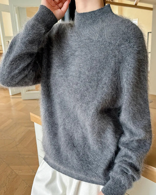 Soft cashmere mock-neck sweater for women with low ribbed mock neck, long sleeves and neat ribbed cuffs, a pure cashmere fall-winter pullover for work or weekends.