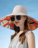 100% cotton double-sided floral bucket hat with an enlarged brim for full-face sun protection. Reversible, lightweight and breathable — casual spring-summer wear.