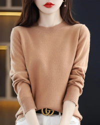 A 100% Australian extrafine merino wool round neck sweater with a straight fit, designed for soft anti-pilling warmth that layers easily over tees and shirts.