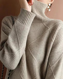 Relaxed crewneck knit pullover — a soft, warm women's sweater in versatile tones.