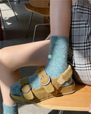Cashmere cotton thermal crew socks featuring a high-tube silhouette, dense terry lining, and premium blend fabric, perfect for delivering warmth and comfort in cold office environments.