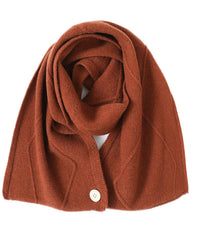 A merino wool neck scarf featuring a twist-flower jacquard knit, a button fastening, and a seamless construction for a polished, artisan look.