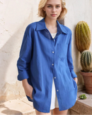 Stylish Oversized shirt with a classic lapel and button placket, offering versatile pairing options for office wear, weekend lounging, or coastal evening strolls.