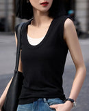 Women's wool-blend crew-neck knitted vest featuring a breathable fabric and elongated silhouette, designed for effortless layering from spring commute to summer resort wear.
