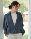 Linen Deep V-Neck Shirt Paired With A White Vest