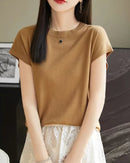 Women's solid-color sleeveless knit sweater featuring a silk-wool-lyocell blend, breathable fabric, and a relaxed O-neck silhouette for minimalist layering.