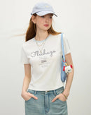 Women's white knit sports t-shirt with crew neck and .Short-length cotton spandex blend top perfect for summer workouts and casual wear.