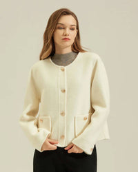 Woman in latte single-breasted crew-neck coat, boxy double-faced wool jacket for polished autumn commutes.