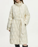 Woman city-strolling in a stand-collar lightweight down coat, 190.6 g white-duck fill and wind-proof matte shell lock in warmth down to 0 °C—your elegant 35-55 °F fall-to-spring commuter layer.