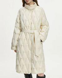 Woman city-strolling in a stand-collar lightweight down coat, 190.6 g white-duck fill and wind-proof matte shell lock in warmth down to 0 °C—your elegant 35-55 °F fall-to-spring commuter layer.