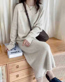 Straight-cut ankle-length cashmere maxi dress, O-neck, long sleeves, soft camel tone—effortless winter elegance for her.