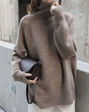 Gentle Herd slouchy  81%-90% wool turtleneck sweater, oversized drop shoulders, ribbed high neck, heather taupe—cloud-soft winter warmth for him or her.