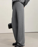 Elegant women's solid color wide leg woolen trousers featuring high waist design and loose relaxed fit, perfect long pants for winter office wear and casual everyday outfits with comfortable soft fabric.