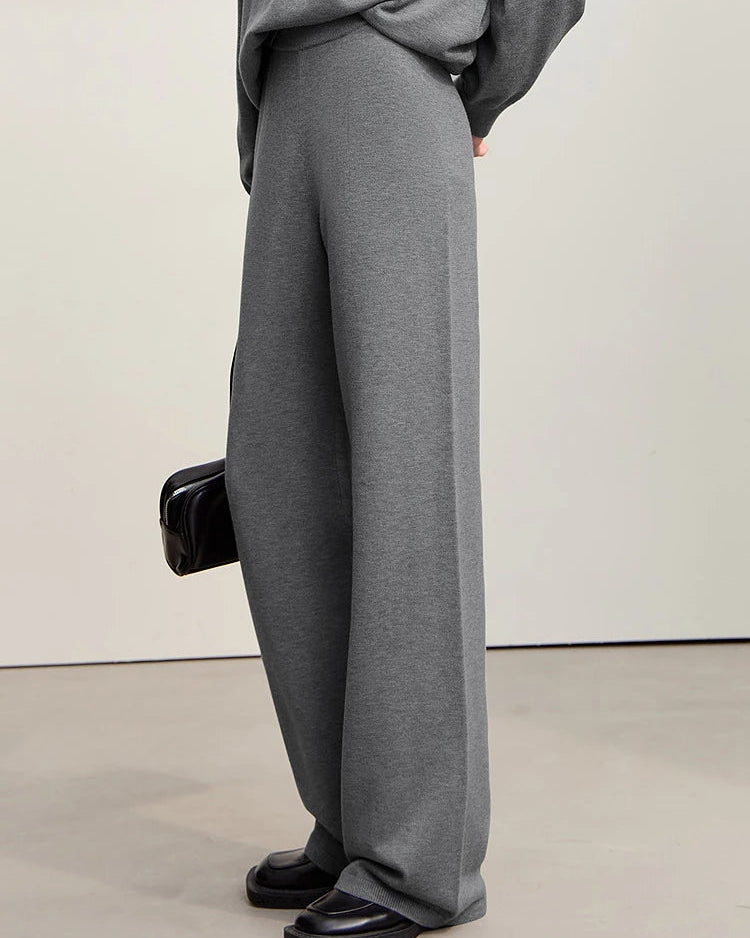Elegant women's solid color wide leg woolen trousers featuring high waist design and loose relaxed fit, perfect long pants for winter office wear and casual everyday outfits with comfortable soft fabric.