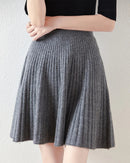 Women's merino-wool wave-pattern mini skirt with high waist and stretch fit—playful autumn piece for campus days, weekend markets or coffee dates.