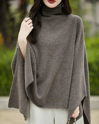 Women’s wool sleeveless cape-style pullover with Korean mid-length cut—airy statement layer for spring picnics, autumn flights or weekend gallery visits.