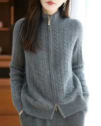 Women’s merino-wool zipper cardigan with thick cable knit and stand collar—cozy statement layer for icy office commutes, weekend cabin escapes or fireside cocoa nights.