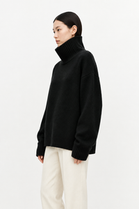 Black cashmere turtleneck sweater side view