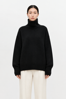 Black cashmere turtleneck sweater front view