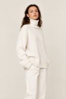 White cashmere turtleneck sweater side view