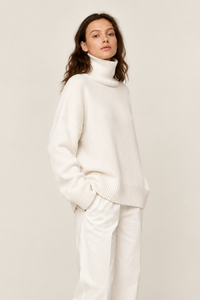 White cashmere turtleneck sweater side view