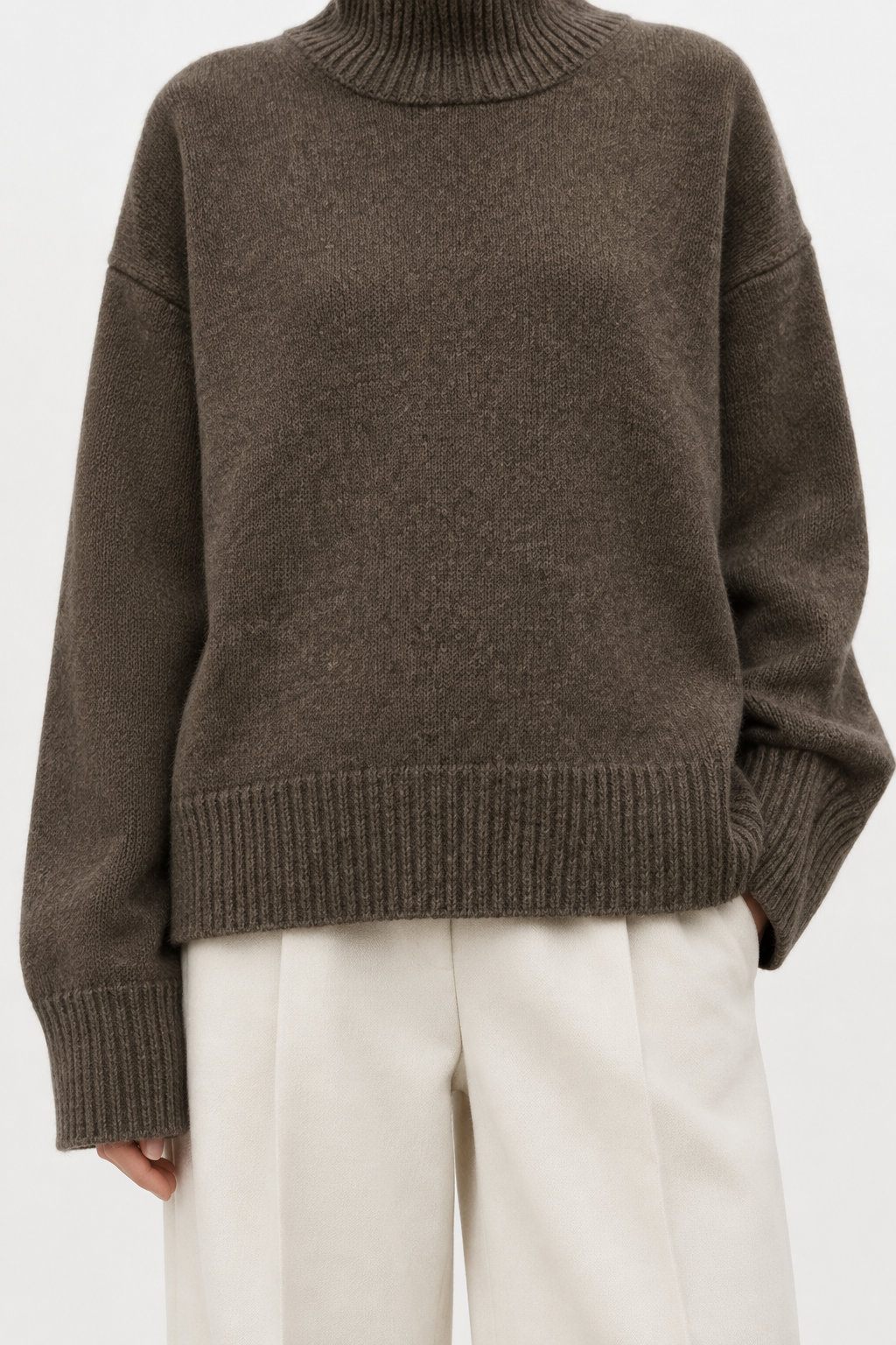 Brown cashmere turtleneck sweater cuff and hem detail
