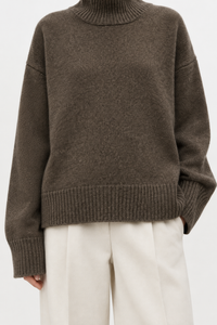 Brown cashmere turtleneck sweater cuff and hem detail