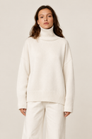 White cashmere turtleneck sweater front view