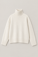 White cashmere turtleneck sweater flat lay