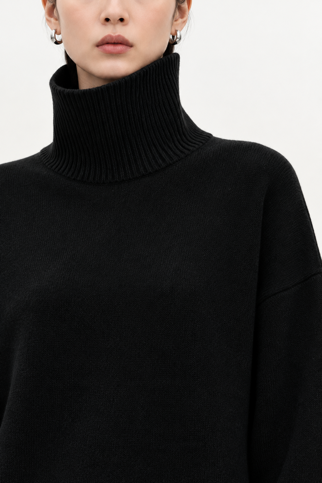 Black cashmere turtleneck sweater collar detail